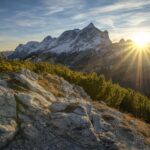 snow covered mountain during sunrise